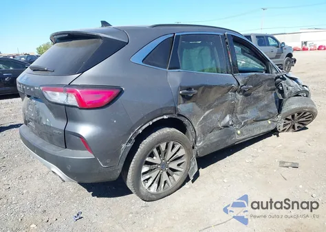 2021 Ford Escape Titanium Hybrid z USA, uszkodzony, nr VIN 1FMCU9DZ7MUA41072